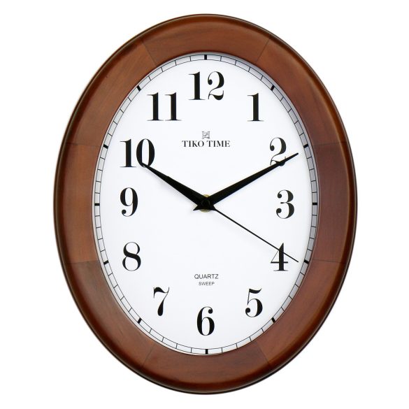 Tiko Time fa falióra, quartz, sweep (halk járású) szerkezet, ovál alakú 30 cm, tölgy színű tok, fehér arab számos számlap
